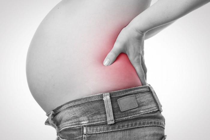 Боль в спине при беременности